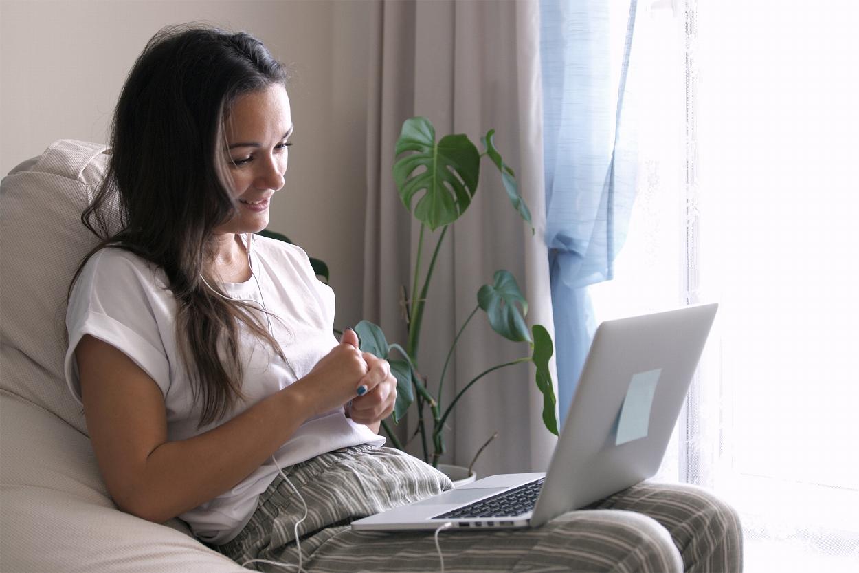Woman using laptop for online counselling