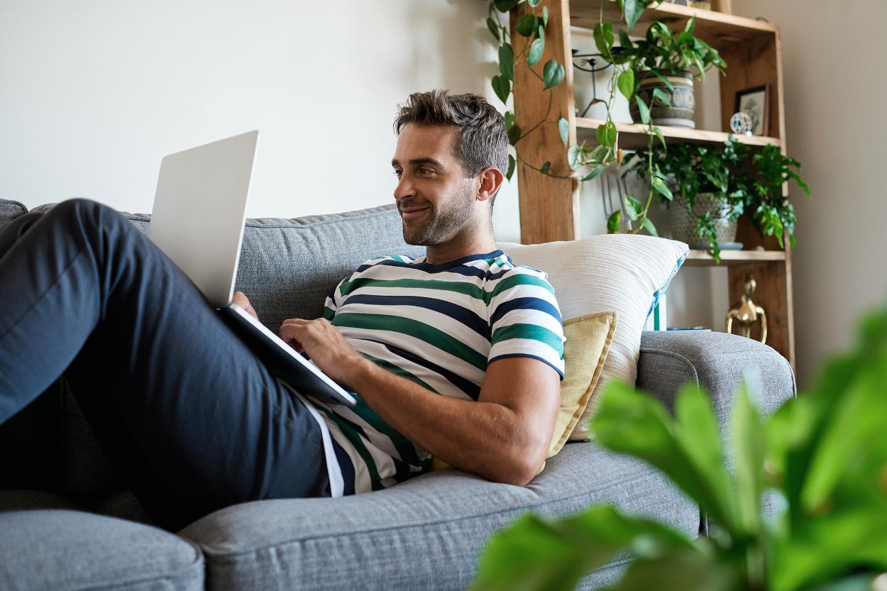 Relaxed man attending online humanistic therapy